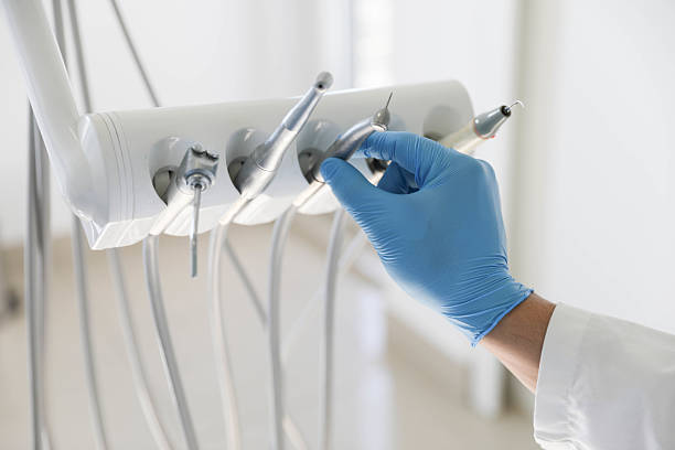 Professional Tooth Extraction technician working in Hettinger County County, ND